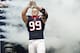 HOUSTON, TX - NOVEMBER 04: J.J. Watt #99 of the Houston Texans is introduced the crows at Reliant Stadium before playing the Buffalo Bills on November 4, 2012 in Houston, Texas. (Photo by Bob Levey/Getty Images)