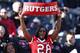 CINCINNATI, OH - NOVEMBER 17: Rutgers Scarlet Knights fan celebrates in the closing seconds of the game against the Cincinnati Bearcats at Nippert Stadium on November 17, 2012 in Cincinnati, Ohio. Rutgers won 10-3. (Photo by Joe Robbins/Getty Images)