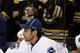 BOSTON, MA - JANUARY 07: Roberto Luongo #1 of the Vancouver Canucks looks on from the bench in the first period against the Boston Bruins on January 7, 2012 at TD Garden in Boston, Massachusetts. (Photo by Elsa/Getty Images)