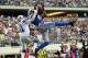 ARLINGTON, TX - OCTOBER 02: Calvin Johnson #81 of the Detroit Lions makes a touchdown pass reception for the win over Terence Newman #41 of the Dallas Cowboys at Cowboys Stadium on October 2, 2011 in Arlington, Texas. The Lions defeated the Cowboys 34-30. (Photo by Ronald Martinez/Getty Images)