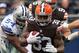 ARLINGTON, TX - NOVEMBER 18: Trent Richardson #33 of the Cleveland Browns runs the ball past Bruce Carter #54 of the Dallas Cowboys at Cowboys Stadium on November 18, 2012 in Arlington, Texas. (Photo by Ronald Martinez/Getty Images)