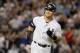 NEW YORK, NY - AUGUST 13: Nick Swisher #33 of the New York Yankees smiles at his dugout as he runs the bases after his third inning grand slam against the Texas Rangers at Yankee Stadium on August 13, 2012 in the Bronx borough of New York City. (Photo by Jim McIsaac/Getty Images)