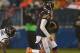 CHICAGO, IL - NOVEMBER 11: Jay Cutler #6 of the Chicago Bears breaks away from Tim Dobbins #52 of the Houston Texans at Soldier Field on November 11, 2012 in Chicago, Illinois. The Texans defeated the Bears 13-6. (Photo by Jonathan Daniel/Getty Images)