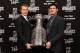 Dustin Brown (left) and Jonathan Quick hold the Stanley Cup.