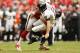 Oct 21, 2012; Houston, TX, USA; Houston Texans outside linebacker Connor Barwin (98) hits Baltimore Ravens quarterback Joe Flacco (5) during the second half at Reliant Stadium. Mandatory Credit: Thomas Campbell-US PRESSWIRE