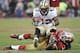 SAN FRANCISCO, CA - JANUARY 14: Darren Sproles #43 of the New Orleans Saints gets tackled by Dashon Goldson #38 of the San Francisco 49ers in the fourth quarter during the Divisional Playoffs at Candlestick Park on January 14, 2012 in San Francisco, California. The 49ers won the game 36-32. (Photo by Thearon W. Henderson/Getty Images)