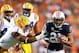 AUBURN, AL - SEPTEMBER 22: Tre Mason #21 of the Auburn Tigers rushes away from Eric Reid #1 of the LSU Tigers at Jordan Hare Stadium on September 22, 2012 in Auburn, Alabama. (Photo by Kevin C. Cox/Getty Images)