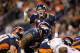 DENVER, CO - NOVEMBER 18: Quarterback Peyton Manning #18 of the Denver Broncos calls an audible against the San Diego Chargers at Sports Authority Field Field at Mile High on November 18, 2012 in Denver, Colorado. (Photo by Justin Edmonds/Getty Images)