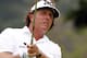 SINGAPORE - NOVEMBER 10: Phil Mickelson of USA plays his 2nd shot on the 11th hole during the continuation of the rain delayed second round of the Barclays Singapore Open at the Sentosa Golf Club on November 10, 2012 in Singapore. (Photo by Stanley Chou/Getty Images)