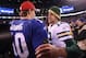 EAST RUTHERFORD, NJ - DECEMBER 04: (L-R) Eli Manning #10 of the New York Giants congratulates Aaron Rodgers #12 of the Green Bay Packers after the Packers won 38-35 at MetLife Stadium on December 4, 2011 in East Rutherford, New Jersey. (Photo by Al Bello/Getty Images)