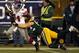GREEN BAY, WI - JANUARY 15: Ahmad Bradshaw #44 of the New York Giants runs against Clay Matthews #52 of the Green Bay Packers during their NFC Divisional playoff game at Lambeau Field on January 15, 2012 in Green Bay, Wisconsin. (Photo by Jonathan Daniel/Getty Images)