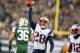 Nov. 22, 2012; East Rutherford, NJ, USA; New England Patriots strong safety Steve Gregory (28) celebrates after intercepting a pass against the New York Jets during the first half on Thanksgiving at MetLife Stadium. Mandatory Credit: Debby Wong-US PRESSWIRE