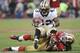 SAN FRANCISCO, CA - JANUARY 14: Darren Sproles #43 of the New Orleans Saints gets tackled by Dashon Goldson #38 of the San Francisco 49ers in the fourth quarter during the Divisional Playoffs at Candlestick Park on January 14, 2012 in San Francisco, California. The 49ers won the game 36-32. (Photo by Thearon W. Henderson/Getty Images)