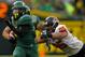 EUGENE, OR - NOVEMBER 26: LaMichael James #21 of the Oregon Ducks out runs Scott Critchton #95 of the Oregon State Beavers during the 115th Civil War on November 26, 2011 at the Autzen Stadium in Eugene, Oregon. (Photo by Jonathan Ferrey/Getty Images)