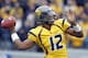 MORGANTOWN, WV - NOVEMBER 03: Geno Smith #12 of the West Virginia Mountaineers drops back to pass against the TCU Horned Frogs during the game on November 3, 2012 at Mountaineer Field in Morgantown, West Virginia. (Photo by Justin K. Aller/Getty Images)