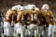 AUSTIN, TX - NOVEMBER 22: David Ash #14 of the Texas Longhorns leads the huddle against the TCU Horned Frogs on November 22, 2012 at Darrell K Royal-Texas Memorial Stadium in Austin, Texas. (Photo by Cooper Neill/Getty Images)