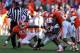 CLEMSON, SC - NOVEMBER 17: Shadrach Thornton #10 of the North Carolina State Wolfpack is stopped by the defense of the Clemson Tigers during their game at Memorial Stadium on November 17, 2012 in Clemson, South Carolina. (Photo by Streeter Lecka/Getty Images)