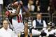 NEW ORLEANS, LA - NOVEMBER 11: Julio Jones #11 of the Atlanta Falcons catches a pass over Jabari Greer #33 of the New Orleans Saints at Mercedes-Benz Superdome on November 11, 2012 in New Orleans, Louisiana. The Saints defeated the Falcons 31-27. (Photo by Wesley Hitt/Getty Images)