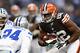 ARLINGTON, TX - NOVEMBER 18: Benjamin Watson #82 of the Cleveland Browns tires to avoid the tackle of Morris Claiborne #24 of the Dallas Cowboys at Cowboys Stadium on November 18, 2012 in Arlington, Texas. The Cowboys defeated the Browns 23-20. (Photo by Wesley Hitt/Getty Images)