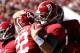 TUSCALOOSA, AL - NOVEMBER 17: AJ McCarron #10 of the Alabama Crimson Tide celebrates with Christion Jones #22 after Jones' touchdown against the Western Carolina Catamounts at Bryant-Denny Stadium on November 17, 2012 in Tuscaloosa, Alabama. (Photo by Kevin C. Cox/Getty Images)