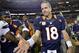 Nov 18 2012; Denver, CO, USA; Denver Broncos quarterback Peyton Manning (18) prepares to shake hands following the win over the San Diego Chargers at Sports Authority Field.The Broncos defeated the Chargers 30-23. Mandatory Credit: Ron Chenoy-US PRESSWIRE
