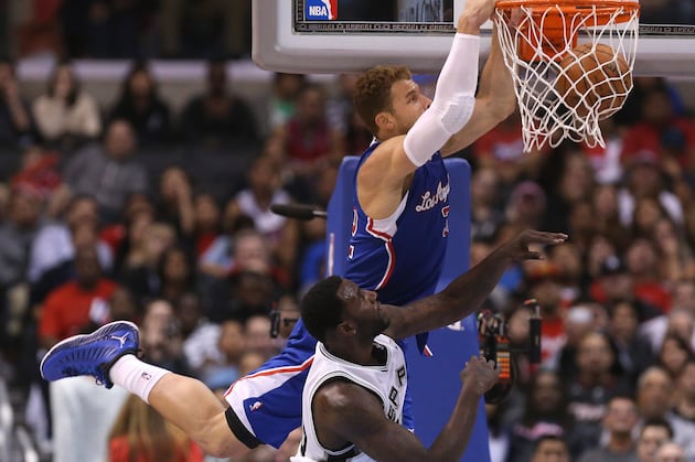 Blake Griffin Meets Deron Williams at the Rim for Huge Block