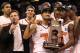 PHOENIX, AZ - MARCH 24: Head coach Rick Pitino, Peyton Siva #3 and Russ Smith #2 of the Louisville Cardinals celebrate after defeating the Florida Gators 72-68 during the 2012 NCAA Men's Basketball West Regional Final at US Airways Center on March 24, 2012 in Phoenix, Arizona. (Photo by Jamie Squire/Getty Images)