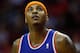 HOUSTON, TX - NOVEMBER 23: Carmelo Anthony #7 of the New York Knicks watches a shot against the Houston Rockets at the Toyota Center on November 23, 2012 in Houston, Texas. NOTE TO USER: User expressly acknowledges and agrees that, by downloading and or using this photograph, User is consenting to the terms and conditions of the Getty Images License Agreement. (Photo by Scott Halleran/Getty Images)