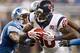 DETROIT, MI - NOVEMBER 22: Andre Johnson #80 of the Houston Texans tries to get around the tackle of Ricardo Silva #39 of the Detroit Lions after a overtime catch at Ford Field on November 22, 2012 in Detroit, Michigan. Houston won the game 34-31. (Photo by Gregory Shamus/Getty Images)