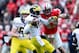 Nov 24, 2012; Columbus, OH, USA; Michigan Wolverines quarterback Devin Gardner (12) is sacked by Ohio State Buckeyes defensive lineman Nathan Williams (43) in the fourth quarter at Ohio Stadium. Mandatory Credit: Andrew Weber-US PRESSWIRE
