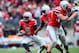 Nov 24, 2012; Columbus, OH, USA; Ohio State Buckeyes quarterback Braxton Miller (5) runs the ball in the third quarter against the Michigan Wolverines at Ohio Stadium. Mandatory Credit: Andrew Weber-US PRESSWIRE
