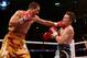 MANCHESTER, ENGLAND - NOVEMBER 24: Ricky Hatton of Great Britain (R) is caught by Vyacheslav Senchenko of Ukraine during their Welterweight bout at the MEN Arena on November 24, 2012 in Manchester, England. (Photo by Scott Heavey/Getty Images)