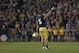SOUTH BEND, IN - NOVEMBER 17: Manti T'eo #5 of the Notre Dame Fighting Irish waves to the crowd as he leaves the home field for the last time during a game against the Wake Forest Demon Deacons at Notre Dame Stadium on November 17, 2012 in South Bend, Indiana. Notre Dame defeated Wake Forest 38-0. (Photo by Jonathan Daniel/Getty Images)