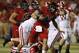 Sep 29, 2012; Lincoln, NE, USA; Nebraska Cornhuskers quarterback Taylor Martinez (3) runs over Wisconsin Badgers defender Michael Trotter (43) at Memorial Stadium in the first half. Mandatory Credit: Bruce Thorson-US PRESSWIRE