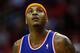 HOUSTON, TX - NOVEMBER 23: Carmelo Anthony #7 of the New York Knicks watches a shot against the Houston Rockets at the Toyota Center on November 23, 2012 in Houston, Texas. NOTE TO USER: User expressly acknowledges and agrees that, by downloading and or using this photograph, User is consenting to the terms and conditions of the Getty Images License Agreement. (Photo by Scott Halleran/Getty Images)