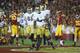 LOS ANGELES, CA - NOVEMBER 24: Running back Theo Riddick #6 of the Notre Dame Fighting Irish celebrates a touchdown with teammate Braxston Cave #52 in the first half against the USC Trojans at Los Angeles Memorial Coliseum on November 24, 2012 in Los Angeles, California. (Photo by Jeff Gross/Getty Images)
