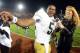 LOS ANGELES, CA - NOVEMBER 24: Everett Golson #5 of the Notre Dame Fighting Irish smiles as he gives an interview to Heather Cox of ESPN after a 22-13 win over the USC Trojans at Los Angeles Memorial Coliseum on November 24, 2012 in Los Angeles, California. (Photo by Harry How/Getty Images)
