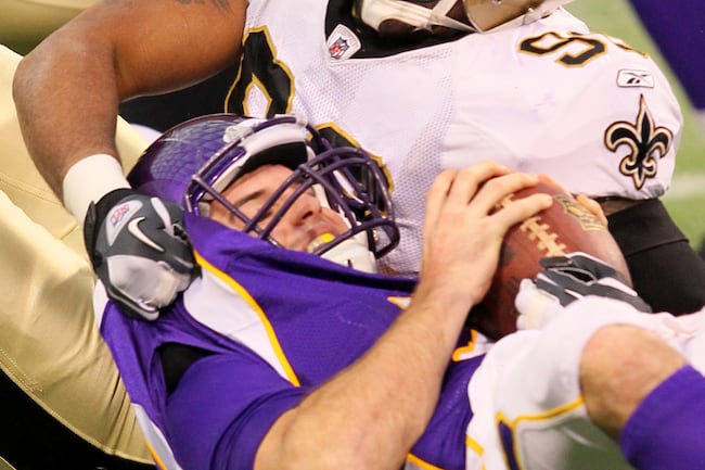 Christian Ponder is sacked for a 9-yard loss on the first play from scrimmage.