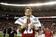TUSCALOOSA, AL - NOVEMBER 24: AJ McCarron #10 of the Alabama Crimson Tide runs onto the field after their 49-0 win over the Auburn Tigers at Bryant-Denny Stadium on November 24, 2012 in Tuscaloosa, Alabama. (Photo by Kevin C. Cox/Getty Images)