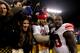 GREEN BAY, WI - JANUARY 15: Victor Cruz #80 of the New York Giants celebrates with fans after play against the Green Bay Packers during their NFC Divisional playoff game at Lambeau Field on January 15, 2012 in Green Bay, Wisconsin. (Photo by Jamie Squire/Getty Images)