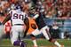 CHICAGO, IL - NOVEMBER 25: Jay Cutler #6 of the Chicago Bears is chased by Fred Evans #90 of the Minnesota Vikings at Soldier Field on November 25, 2012 in Chicago, Illinois. The Bears defeated the Vikings 28-10. (Photo by Jonathan Daniel/Getty Images)