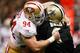 NEW ORLEANS, LA - NOVEMBER 25: Drew Brees #9 of the New Orleans Saints is sacked by Justin Smith #94 of the San Francisco 49ers at The Mercedes-Benz Superdome on November 25, 2012 in New Orleans, Louisiana. (Photo by Chris Graythen/Getty Images)