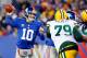 EAST RUTHERFORD, NJ - NOVEMBER 25: Quarterback Eli Manning #10 of the New York Giants drops back against the Green Bay Packers at MetLife Stadium on November 25, 2012 in East Rutherford, New Jersey. (Photo by Rich Schultz/Getty Images)