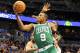 November 25, 2012; Orlando, FL, USA; Boston Celtics point guard Rajon Rondo (9) goes in for a lay up against the Orlando Magic during the first half of the game at The Amway Center. Mandatory Credit: Brad Barr-US PRESSWIRE