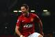 MANCHESTER, ENGLAND - NOVEMBER 24: Javier Hernandez of Manchester United celebrates scoring his team's third goal to make the score 3-1 during the Barclays Premier League match between Manchester United and Queens Park Rangers at Old Trafford on November 24, 2012 in Manchester, England. (Photo by Laurence Griffiths/Getty Images)