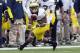 November 24, 2012; Columbus, OH, USA; Michigan Wolverines wide receiver Jeremy Gallon (10) makes a reception against the Ohio State Buckeyes at Ohio Stadium. Ohio State won the game 26-21. Mandatory Credit: Greg Bartram-US PRESSWIRE