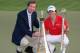 DUBAI, UNITED ARAB EMIRATES - NOVEMBER 25: Rory McIlroy of Northern Ireland (R) poses with the Race To Dubai trophy and DP World Tour Championship trophy next to George O'Grady, Chief Executive of The European Tour, after winning the DP World Tour Championship on the Earth Course at Jumeirah Golf Estates on November 25, 2012 in Dubai, United Arab Emirates. (Photo by Andrew Redington/Getty Images)