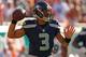 MIAMI GARDENS, FL - NOVEMBER 25: Russell Wilson #3 of the Seattle Seahawks passes during a game against the Miami Dolphins at Sun Life Stadium on November 25, 2012 in Miami Gardens, Florida. (Photo by Mike Ehrmann/Getty Images)