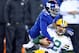 EAST RUTHERFORD, NJ - NOVEMBER 25: Strong safety Kenny Phillips #21 of the New York Giants tackles quarterback Aaron Rodgers #12 of the Green Bay Packers at MetLife Stadium on November 25, 2012 in East Rutherford, New Jersey. (Photo by Al Bello/Getty Images)