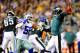 November 11, 2012; Philadelphia, PA, USA; Philadelphia Eagles quarterback Michael Vick (7) passes in front of Dallas Cowboys inside linebacker Ernie Sims (59) during the second quarter at Lincoln Financial Field. Mandatory Credit: Dale Zanine-US PRESSWIRE